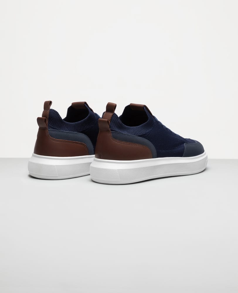 Tenis casual azul marinho RS Knit vista traseira do calcanhar