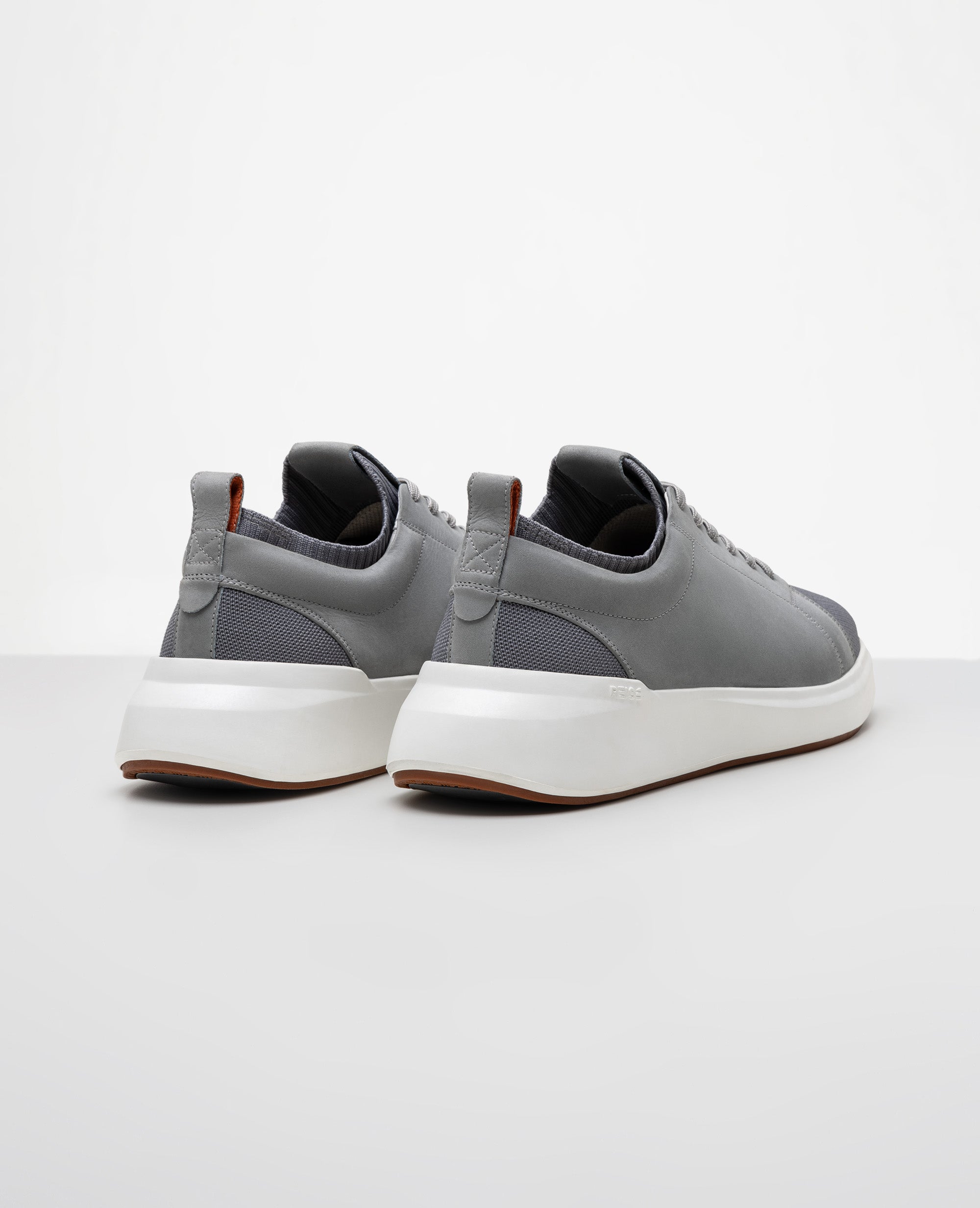 Tenis casual cinza RS Knit GT vista traseira do calcanhar