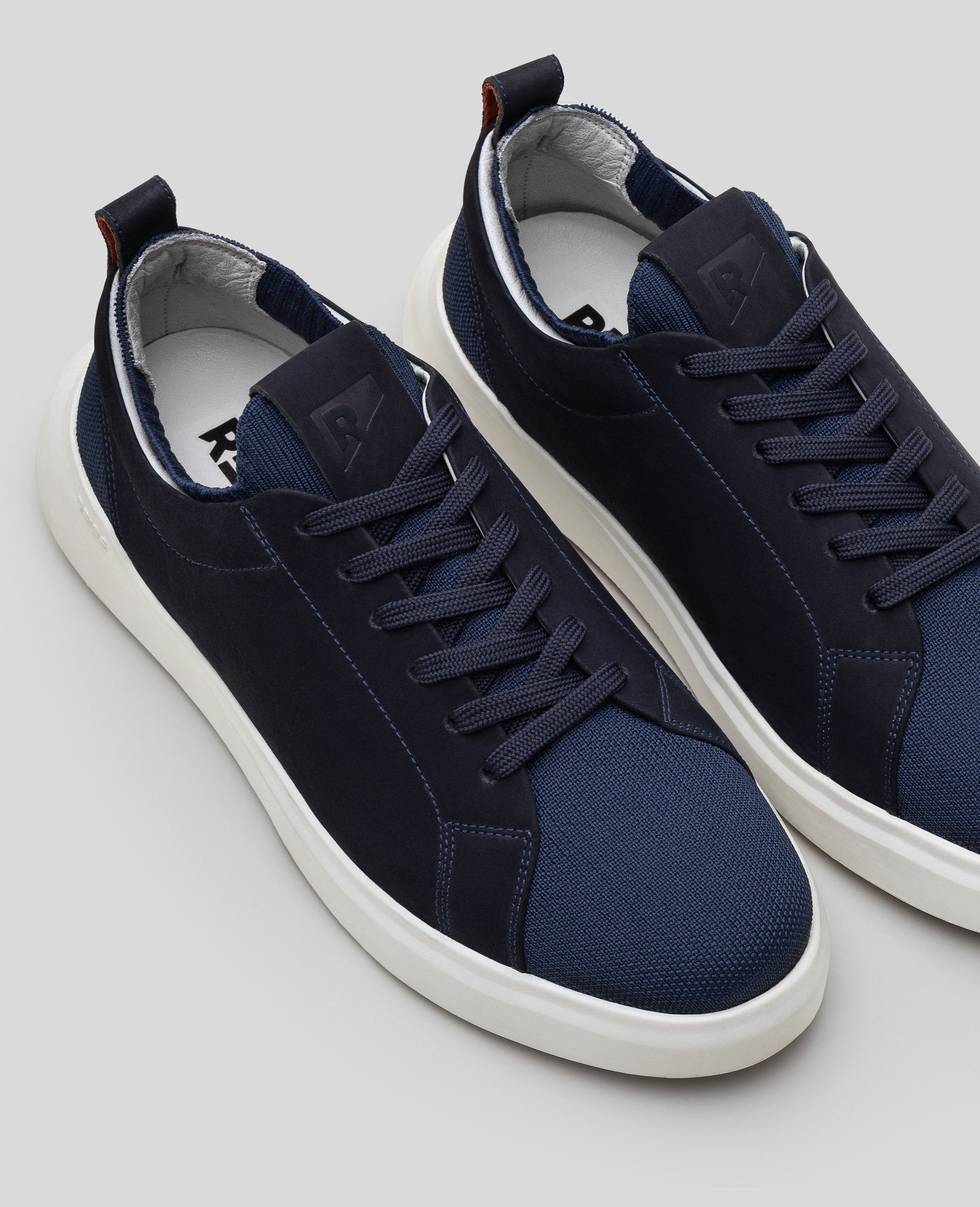 Tenis casual marinho RS Knit GT vista superior do cabedal em knit