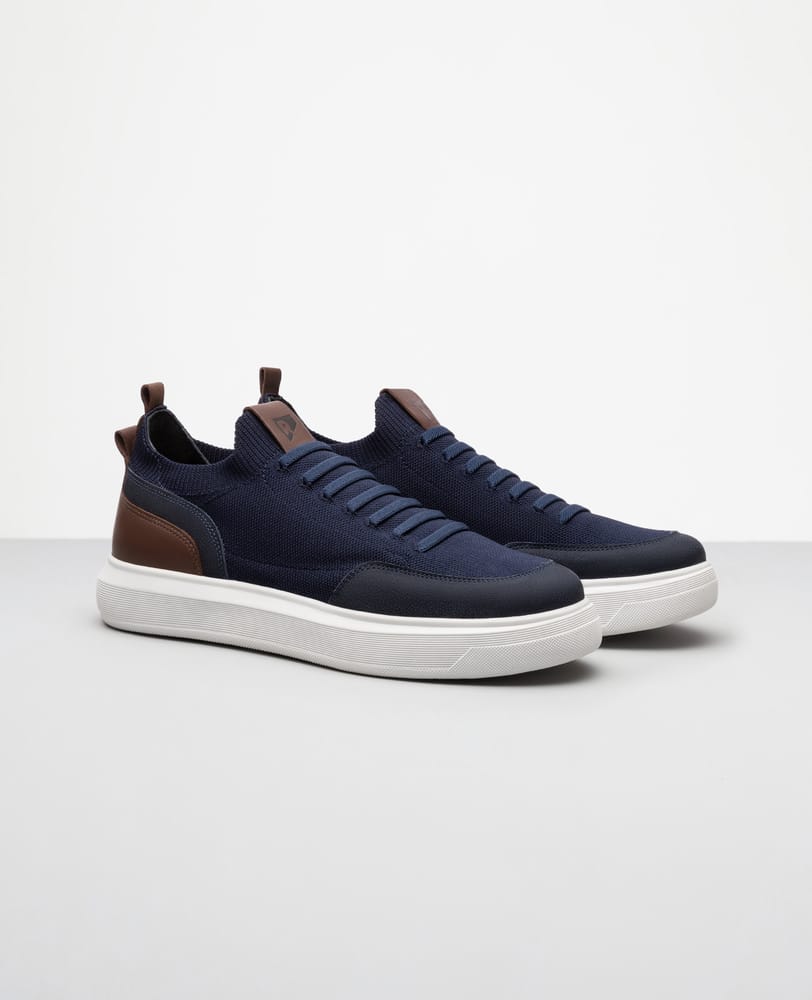 Tenis casual azul marinho RS Knit vista lateral externa