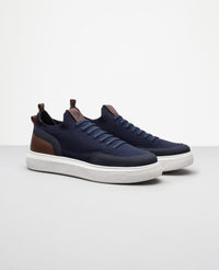 Tenis casual azul marinho RS Knit vista lateral externa
