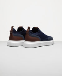 Tenis casual azul marinho RS Knit vista traseira do calcanhar