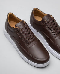 Tenis casual marrom RS7 vista superior do cabedal